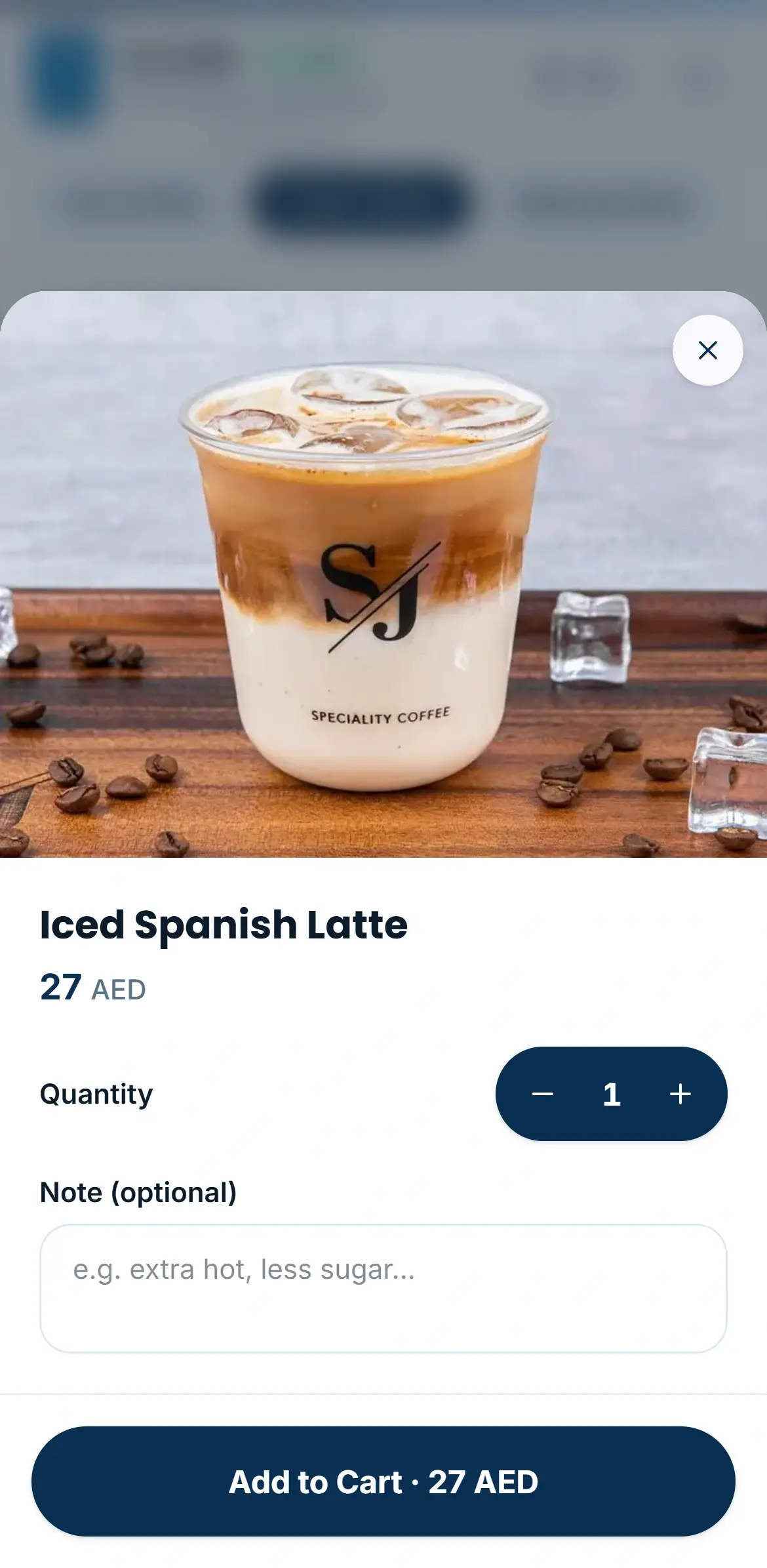 SJ Cafe concept product sheet for Iced Spanish Latte, 27 AED, with quantity, an optional note and Add to Cart.